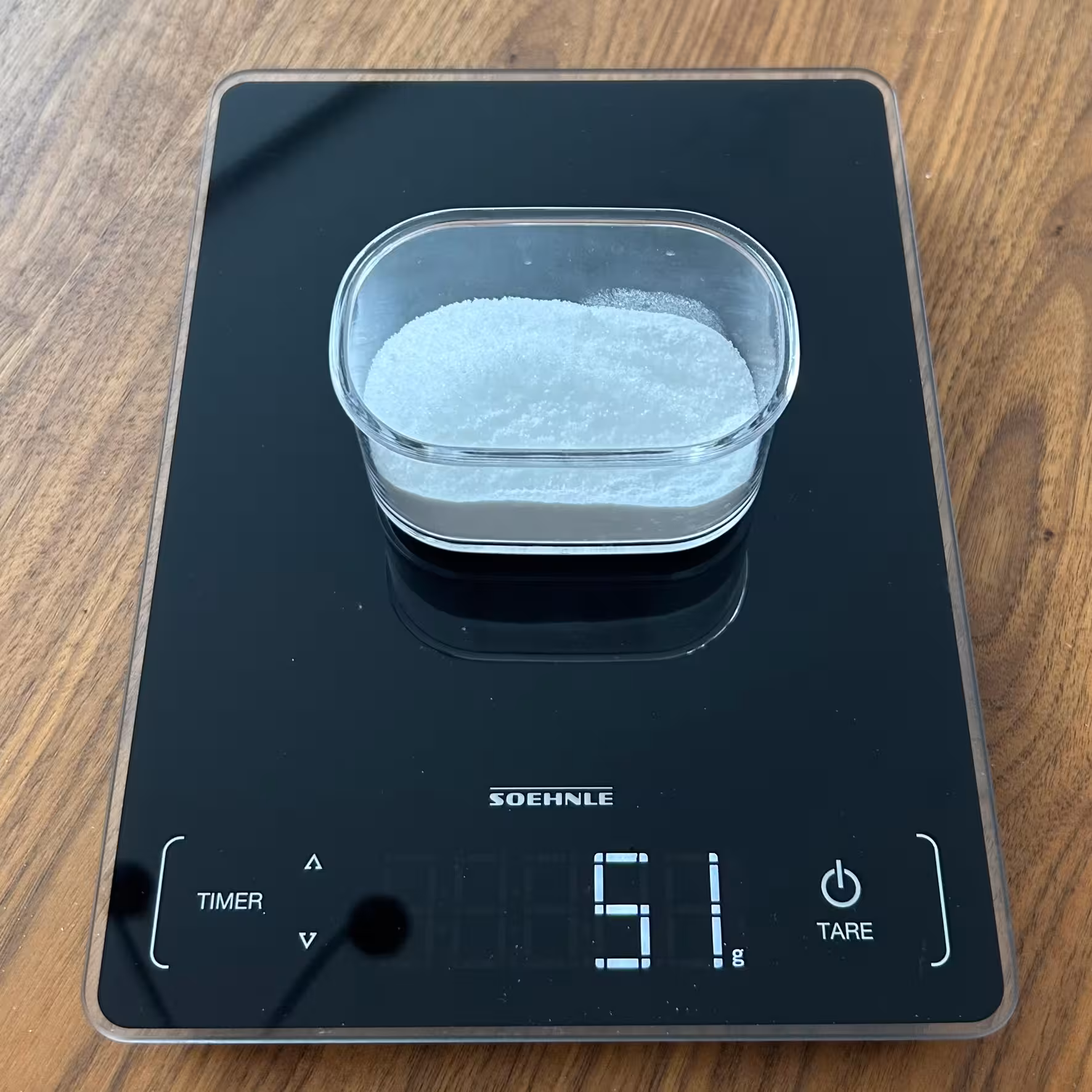 Image of scale with powder mixture